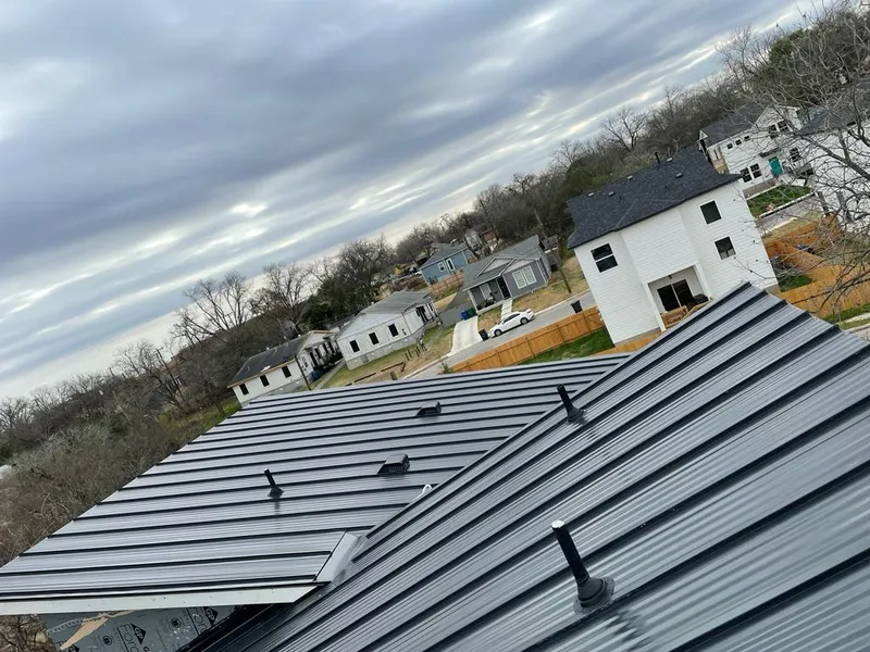 Standing seam metal roof panels with vents for Skylight Repair in Hartford